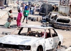 Cars were burnt during a mortal fight between the Yoruba and Hausa people in Agiliti, Mile 12, Lagos state, on 3 March 2016