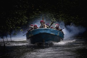 Ateke Tom boys are arriving to their camp 9 hidden in the mangrove, Niger Delta, Nigeria, July 2009.(Image credit Veronique de Viguerie/ Getty Images)