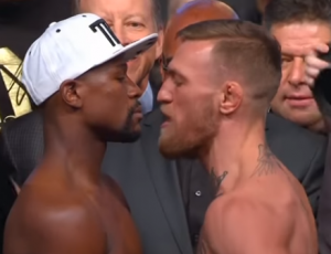 Floyd Mayweather Jr (L) and Conor McGregor