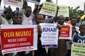 Protesters demand that ailing President Mohammadu Buhari resume work or resign, Aug. 7, 2017. (Credit to Philip Ojisua/AFP via Getty Images)