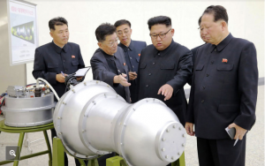North Korea's Supreme Leader Kim Jong-un inspects what the communist State claims to be hydrogen bomb that can be mounted on a delivery vehicle. [Image credit Korean Central News Agency (KCNA), 3rd Sept. 2017].