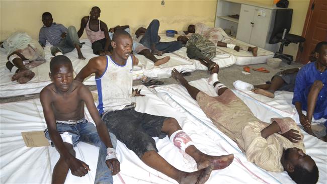Boko Haram attack - The injured receive treatment at a hospital after massive bomb blasts rocked the northeastern Nigerian city of Maiduguri, Sept. 21, 2015