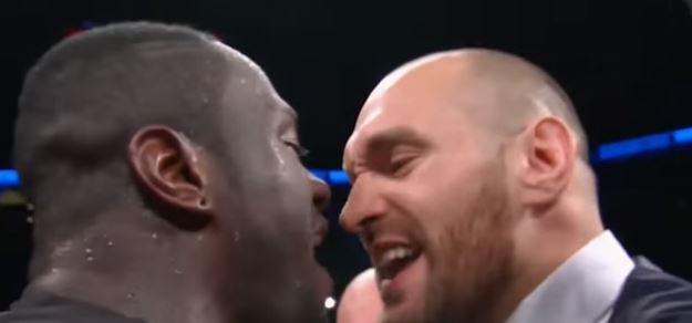 Deontay Wilder (L) and Tyson Fury