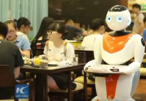 Chinese robot cooks, serves food at restaurant