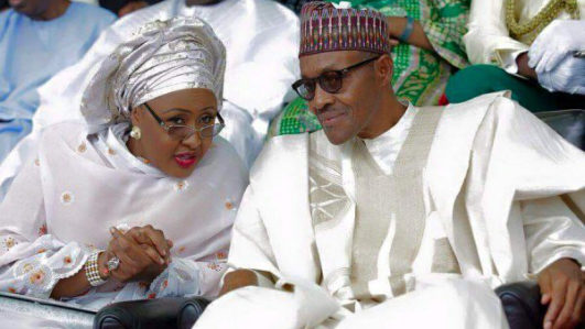 Aisha Buhari (L) and Muhammadu Buhari