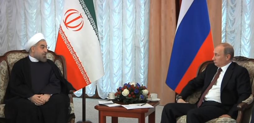 Hassan Rouhani (L) and Vladimir Putin