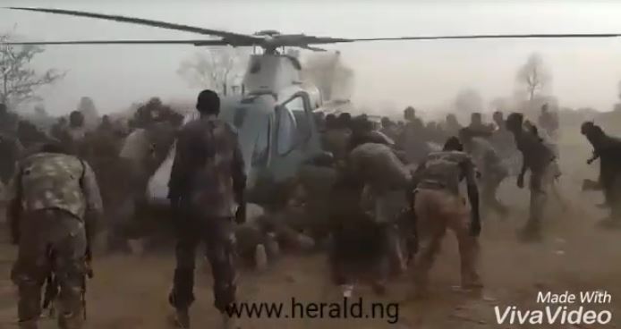 Nigerian soldiers fighting Boko Haram scramble for water, food in Sambisa forest. (Image is a screen shot from the video clip)