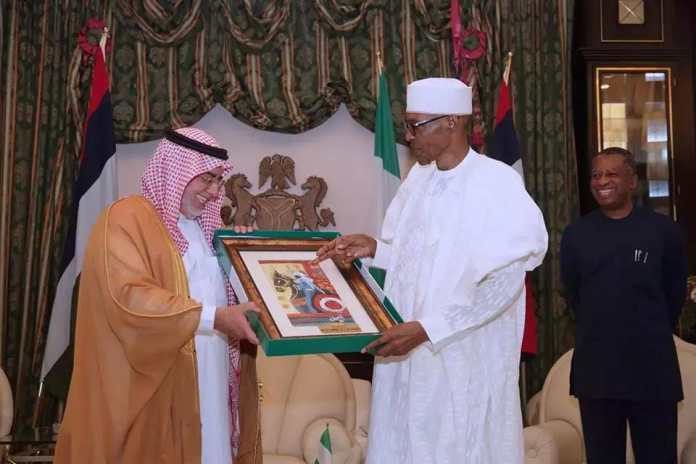 Buhari presents gift to Saudi Arabia's outgoing Ambassador, Fahad Abdullah Sefyan (Image credit Voice of Nigeria)
