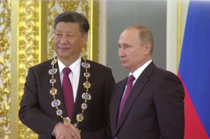 Xi Jinping (L) and Vladimir Putin