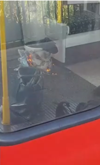 The image of a bag on fire inside a train at Parsons Green station, 15th September 2017.