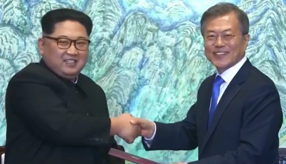 North Korea Leader Kim Jong-Un (L) and South Korean President Moon Jae-In meet in Panmunjom on Friday 27 April 2018