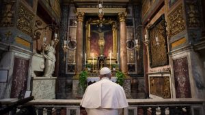 Pope Francis prays before the miraculous crucifix at the church of San Marcello on the Corso (Vatican Media)