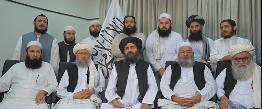 Taliban leader, Mullah Abdul Ghani Baradar, seated in the middle.